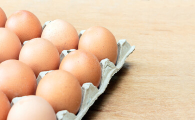Eggs in a panel, eggs on wooden floor.