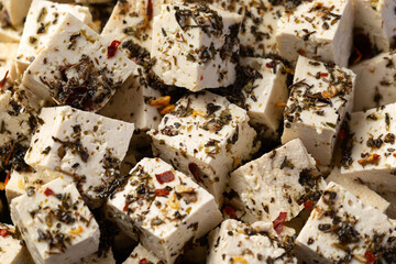 Vegan Tofu feta cheese with dried oregano, basil, thyme and garlic. Healthy Food.