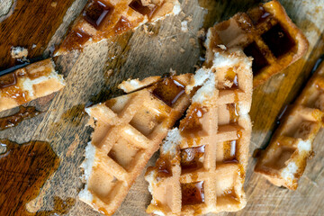 square sweet soft waffles in bee honey
