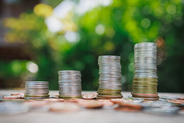 Saving money for wealth and growth of business income  concept. Stacking coins for financial...