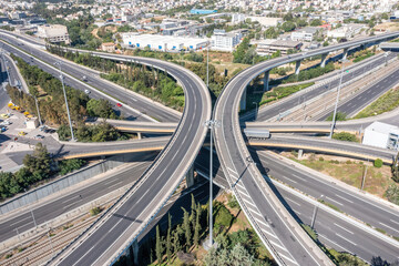 Attiki Odos toll road interchange and National highway in Attica, Athens, Greece. Aerial drone view