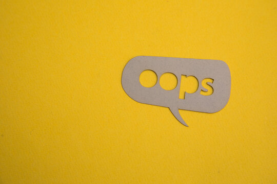 Paper circle with oops inscription