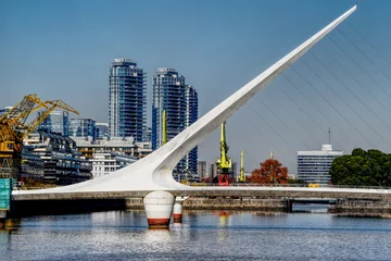 Schilderijen op glas The Puente de la Mujer Spanish for "Woman's Bridge" located in Buenos Aires Argentina is a rotating footbridge for the Puerto Madero commercial district. © phillips