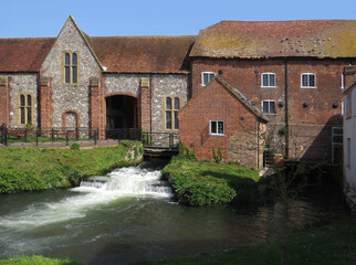 Beautiful view of the historic mill on the Avon River in the old city of Salisbury. England. United Kingdom.