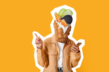 Woman with tasty sweet bubble waffle instead of her head and phone on yellow background