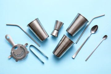 Modern bartender kit on blue background