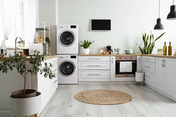 Foto op Plexiglas Stylish interior of kitchen with modern washing machines © Pixel-Shot