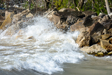 A wave crashes into the break wall at Coral Dock Park in Port Washington, Wisconsin.