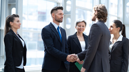 Business people shaking hands