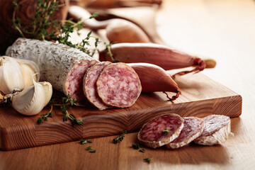 Dry-cured sausage with thyme, garlic, and onion.