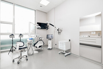 Dentist chair and contemporary equipment in medical office
