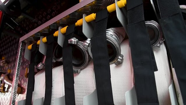 Set of water hoses inside fire truck