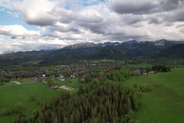 Fototapeta na wymiar Aerial landscape. View of the Tatra Mountains. A beautiful sunny day. Zakopane, Poland 