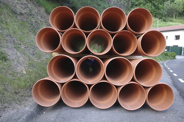 Pipelines piled in the countryside