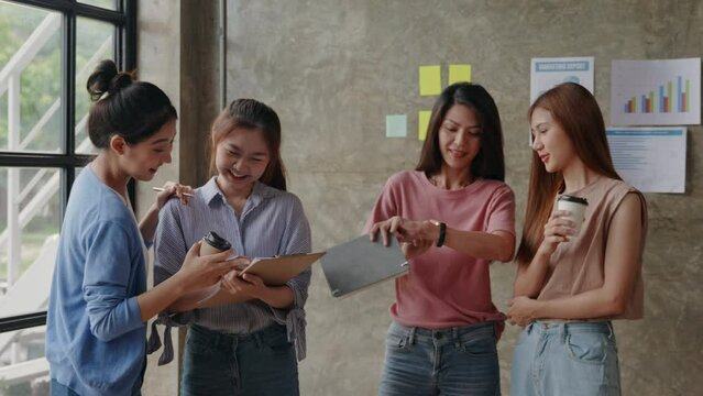 Business people’re talking, discussing on their works for get works on time. Start up project with new creative marketing or products within relax meeting and environment. Soft mood and soft focus.