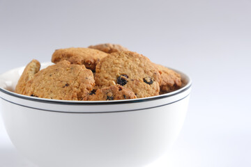 the pile of cookies, crackers, and biscuits delicious in a bowl.