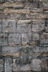 Texture of grunge stone wall. Natural surface. Background of large gray granite blocks.