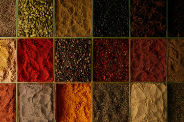 seasoning counter. Oriental spices on the counter. close-up photo. turmeric, saffron, pepper,...