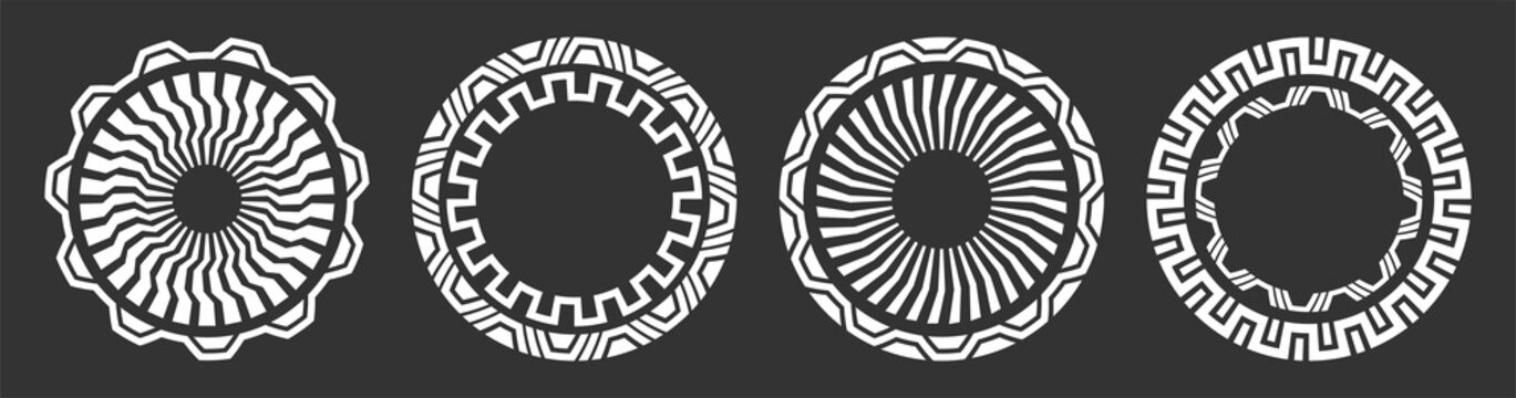 Set of four abstract circular ornaments. Decorative patterns isolated on black background. Tribal ethnic motifs. Mechanical elements, details. Stencil tattoo and prints. Vector monochrome illustration