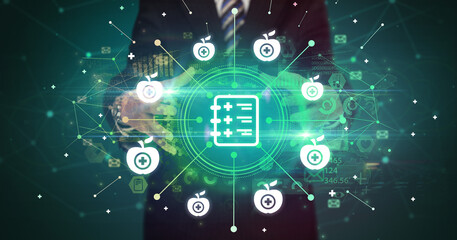 Hand holding healthcare icons concept