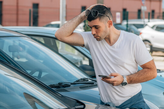 man looking and buying used car