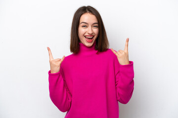 Young Ukrainian woman isolated on white background making horn gesture