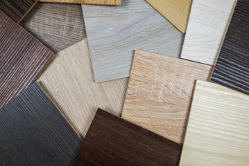 Laminate background. Samples of laminate or parquet with a pattern and texture of wood for flooring...