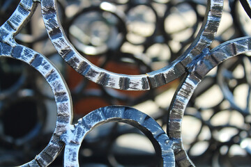 forged metal rings for decoration of park area structures
