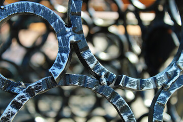 mysterious abstraction of forged metal rings background