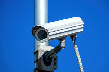 IP CCTV camera hi-technology system installed with waterproof cover to protect camera is security system concept with green nature blur background.