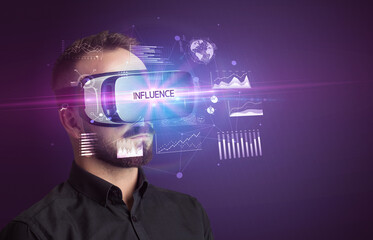 Businessman looking through Virtual Reality glasses