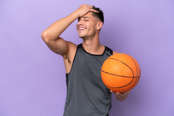 young caucasian woman  basketball player man isolated on purple background has realized something and intending the solution