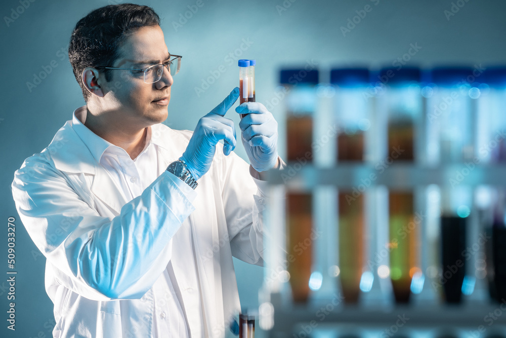 Poster man works in laboratory. man in white coat with test tubes. guy with laboratory test tubes. plastic 