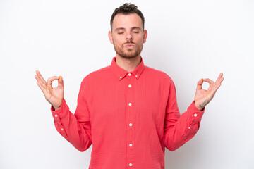 Fototapeta premium Young Brazilian man isolated on white background in zen pose