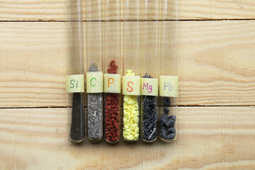 Simple chemicals, non-metals and metals in test tubes: amorphous silicon, gray carbon, crystalline...