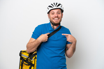 Young brazilian man with thermal backpack isolated on white background with surprise facial expression