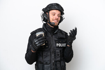 Brazilian soldier man isolated on white background holding coffee to take away and a mobile
