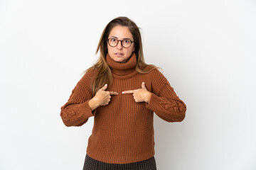 Middle age Brazilian woman isolated on white background with surprise facial expression
