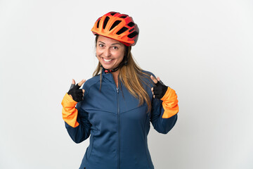 Middle age cyclist woman isolated on white background giving a thumbs up gesture