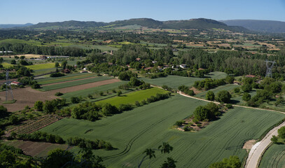 Fototapeta na wymiar aerial view of the green fields of Castilla, Spain