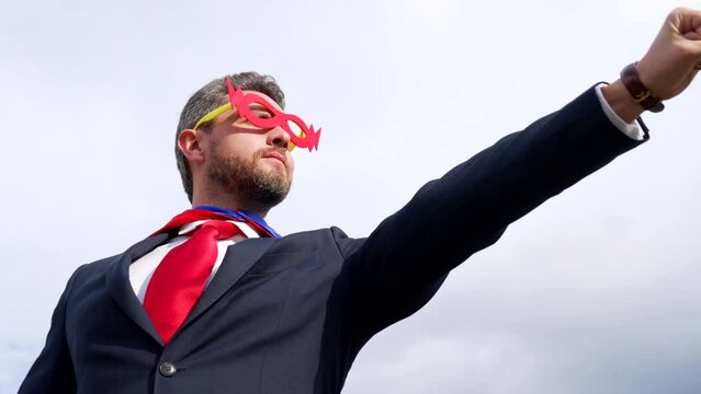 leader aspirations and male courage of successful man in hero mask on sky background, superhero