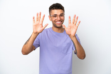 Fototapeta premium Young caucasian Brazilian man isolated on white background counting ten with fingers