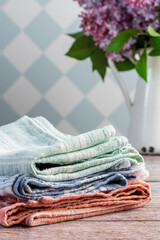 Linen towels on a wooden background