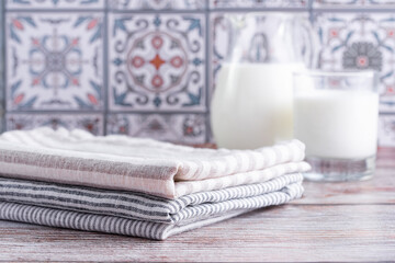 Linen towels on a wooden background