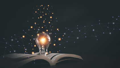 Glowing light bulb on a book, Inspiring from read concept, Educational knowledge and business education ideas, Innovations, self-learning, knowledge and searching for new ideas. Thinking for new idea. - obrazy, fototapety, plakaty