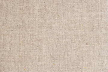 Sackcloth or natural organic burlap background with visible texture