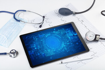 Close-up view of a tablet pc with medical abbreviation