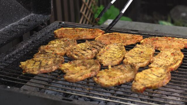 Spicy Pork Beef Bacon Being Grilled Over Bright Glowing Coals Broasting On Fire. Lunch celebration Party Barbecue. Outdoor Cooking. Cook Prepares Oriental Dish In Kitchen. Junk Food, Healthy Lifestyle