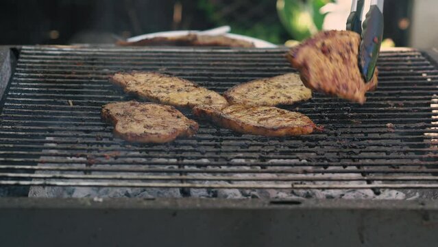 Spicy Pork Beef Bacon Being Grilled Over Bright Glowing Coals Broasting On Fire. Lunch celebration Party Barbecue. Outdoor Cooking. Cook Prepares Oriental Dish In Kitchen. Junk Food, Healthy Lifestyle