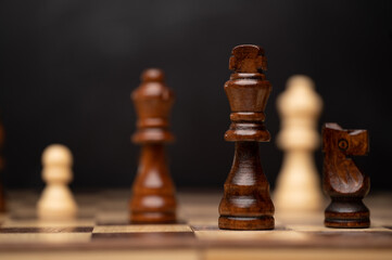 Brown and Ivory Wood Chess Pieces